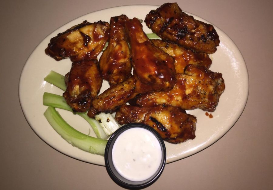 The honey barbecue wings from Hard Times Cafe (pictured), are sweet, but not overpowering, similar to the honey chipotle barbecue wings from Rock Bottom Brewery. Both restaurants are serving up large orders of wings for Super Bowl Sunday. Photo by Matthew van Bastelaer. 
