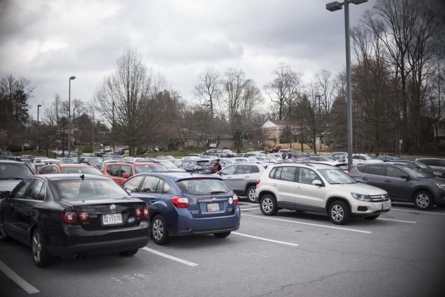 Cars sit parked in the Whitman parking lot. The lot is the scene of a minor accident on a near daily basis. Photo by Annabelle Gordon.