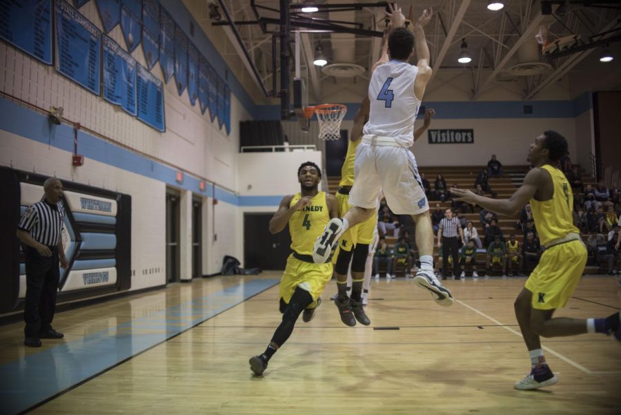 Guard Alex Sanson elevates for a shot against Kennedy Feb. 26. Sason was one of five Whitman athletes named to All-Met teams. Photo by Annabelle Gordon.