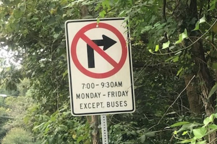 This sign prohibits turning from Bradley Blvd. onto Woodhaven Blvd. during peak morning traffic hours on weekdays. Students have long ignored the sign, but police have recently begun enforcing the law and ticketing violators. 