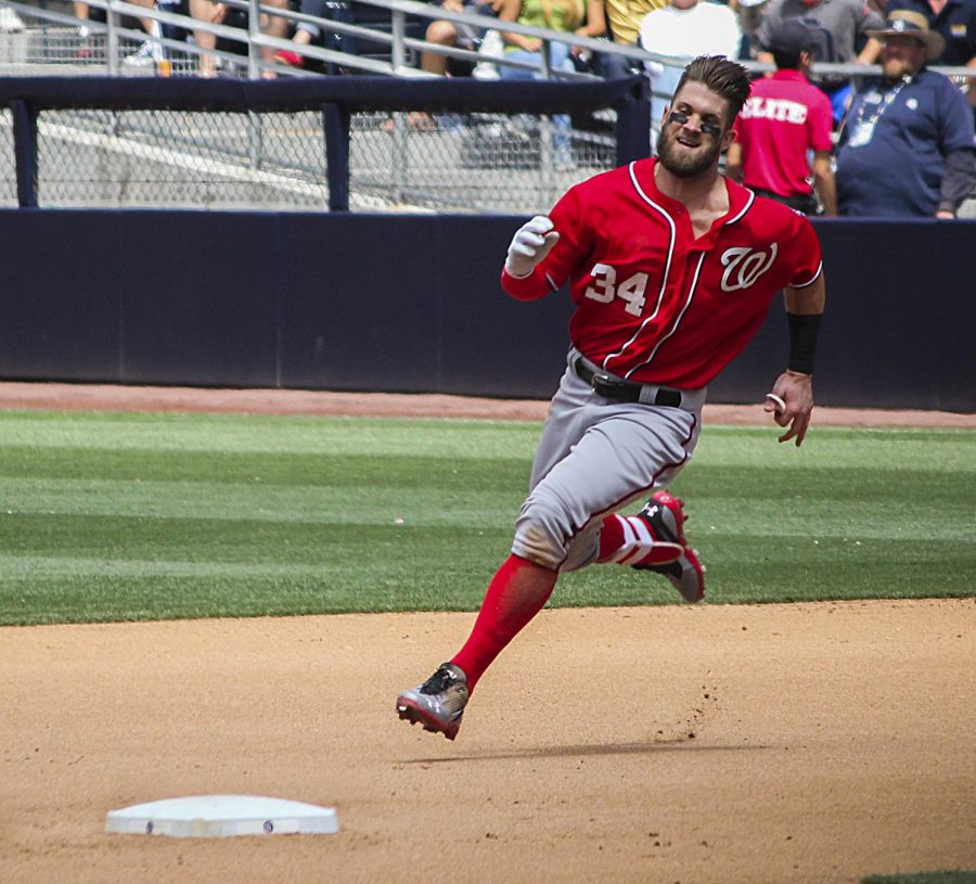 Nationals outfield star Bryce Harper sprints to a base. Harper was a free-agent this off-season, and there have been rumors that he will have offers from multiple teams.