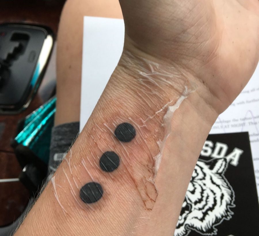 Senior Rob Lloyd got a tattoo on his wrist to celebrate his 18th birthday. Nowadays, tattoos and died hair are more normalized and neither affects ones chances of getting a job in a major way. Photo courtesy Rob Lloyd.