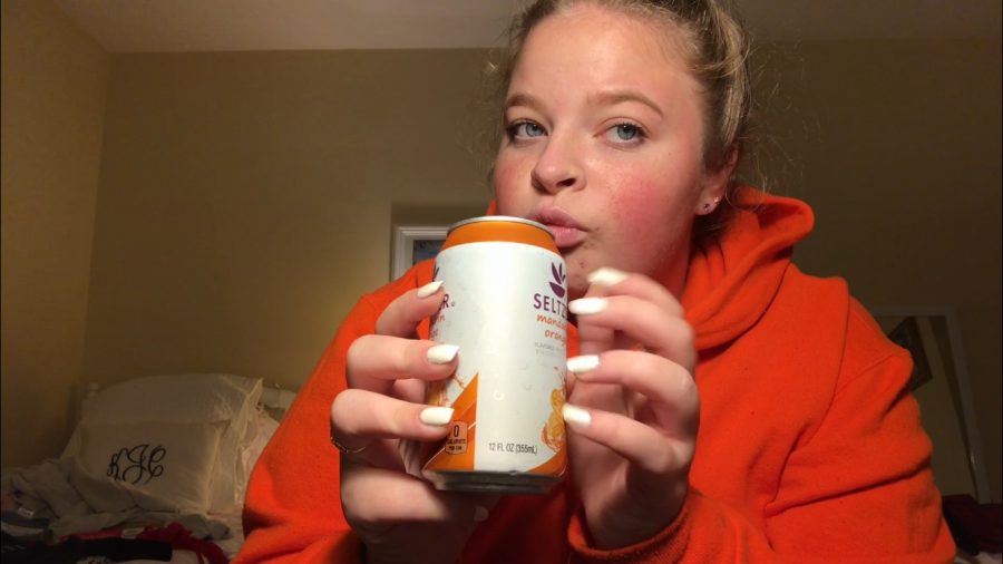 In a screenshot from her own video, senior Kiera Jevtich taps her nails on a soda can as part of an ASMR video. Jevtich makes ASMR videos and posts them on Instagram.
