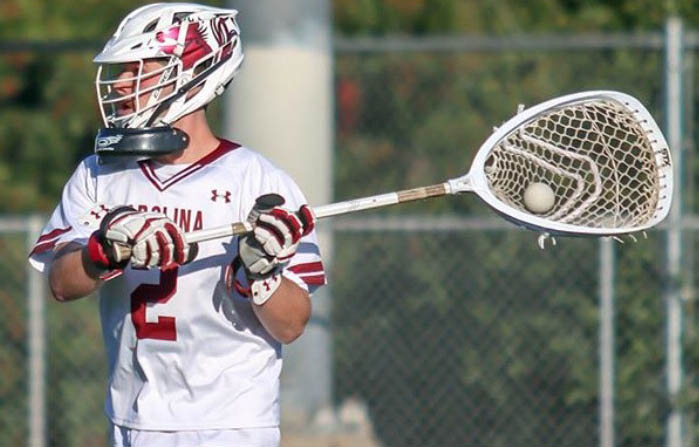Colin Hains (15) plays in a lacrosse game for the University of South Carolina. Hains was recently named the Mens Collegiate Lacrosse Association D1 player of the year. Photo courtesy Colin Hains.
