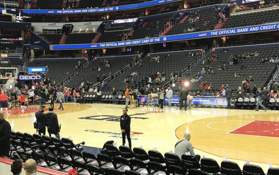 Players warm up as fans settle in before a Wizards vs. Raptors game Jan. 13. Even though the Wizards had a disappointing season, fans should still be proud of the team. Photo by Jesse Rider.