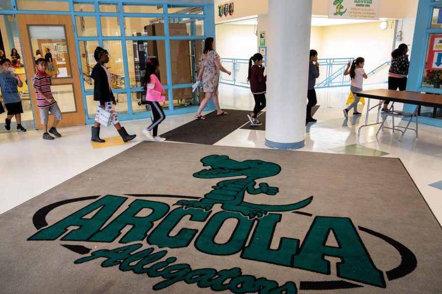 Students at Arcola ES walk to their classrooms. Arcola is one of two Title I elementary schools piloting an extended school year program. Photo courtesy MCPS.