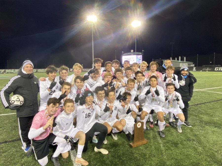 The Vikes pose after the game with the State Championship trophy. The team defeated the Leonardtown Raiders to secure Whitmans eleventh boys soccer state title.