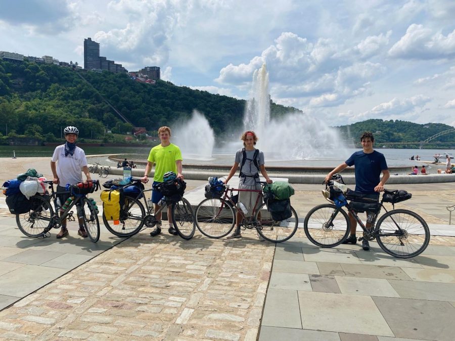 Having completed their journey, the four seniors pose with their bikes in front of Point State Park in Pittsburgh, Pennsylvania. (Pictured left to right: Nicholas Pyle, Jordan Maggin, Finn Martin, Adam Melrod)