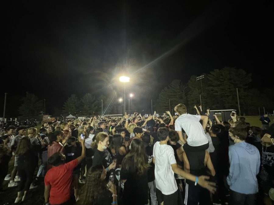 Students dance to the music at Whitmans first outdoor homecoming celebration. The event drew the most students in at least five years, according to Principal Robert Dodd.