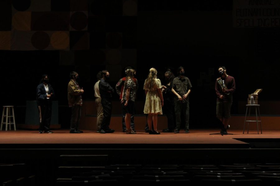 Members+of+Whitman+Drama+test+their+microphones+on+stage+before+opening+night.