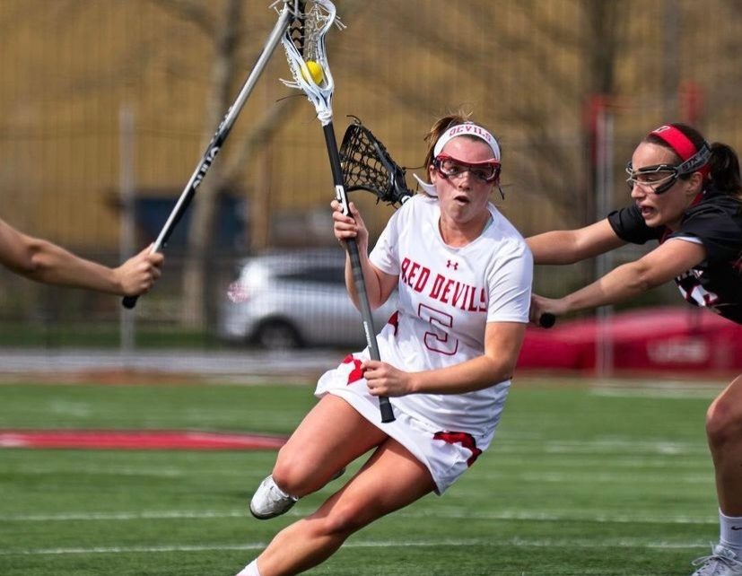After playing lacrosse for the Dickinson Red Devils and serving as Director of Girls Lacrosse at Next Level, Maddie Parker (15) is stepping in as Whitmans new girls varsity lacrosse coach.