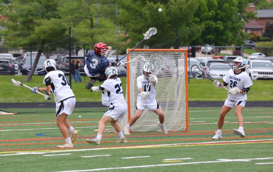 Boys lacrosse takes down Wootton 14–8 in round one of the playoffs