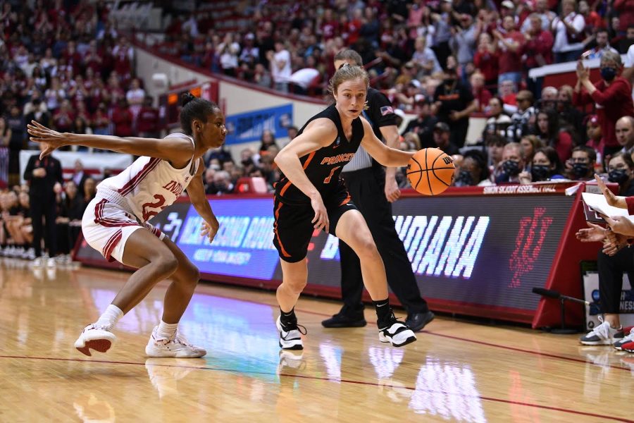 Abby Meyers drives on University of Indiana guard Chloe Moore-McNeil in the second round of the 2022 March Madness tournament.