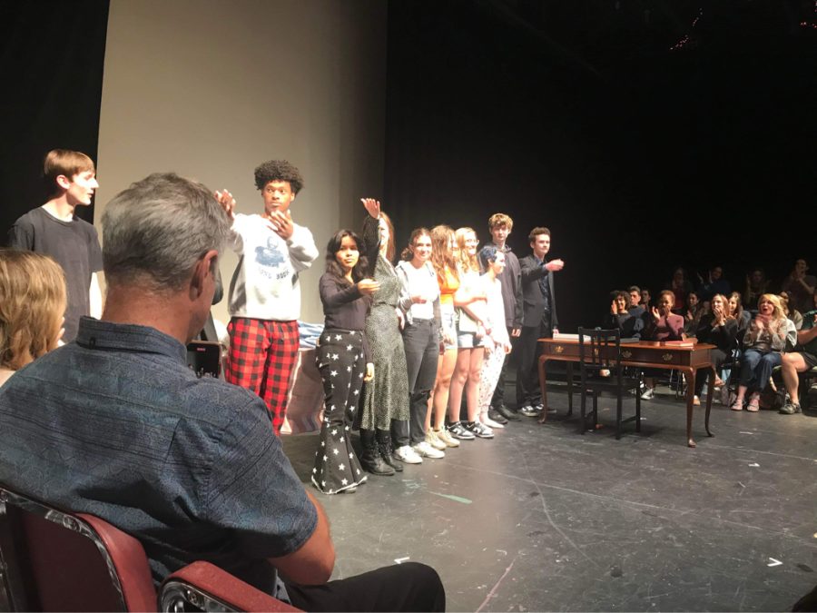 Student performers present One Acts: Strange Tales in front of an audience seated directly onstage.