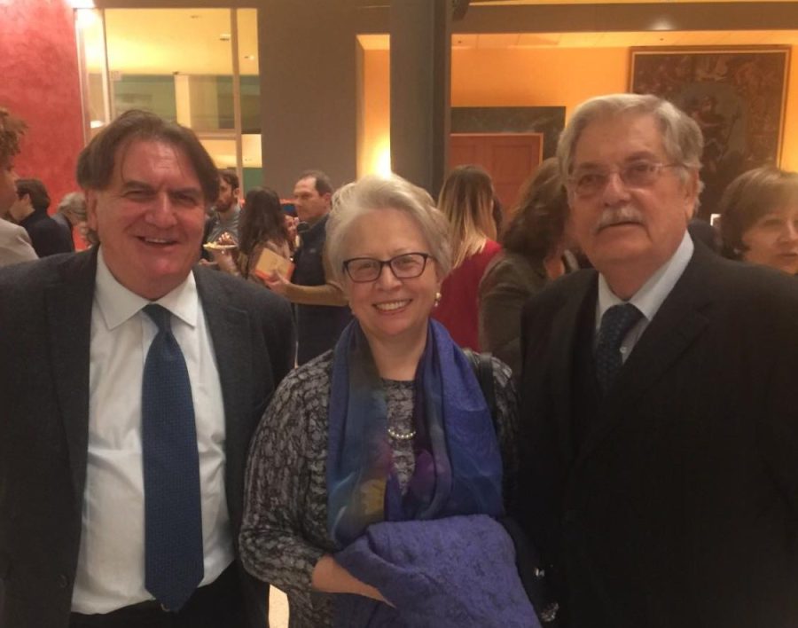 Italian and Latin teacher Olga Mancuso Moscato poses with her husband, Onofrio Moscato (right), and Mr. N. Puccio (left). She will retire at the end of the 2022-2023 school year.