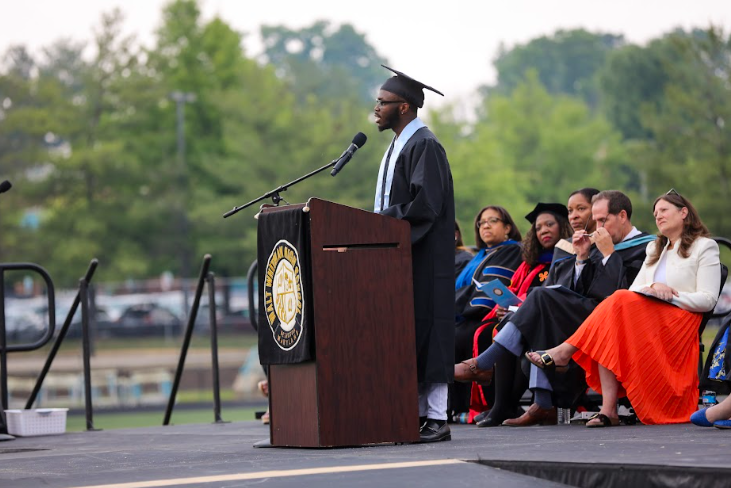 Student speaker Joseph Jones addresses his graduating class in a speech