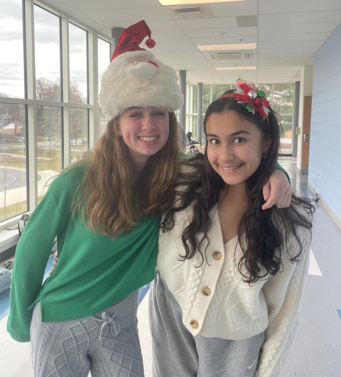 Sophomore Renia Ahmed and Mira Cooper wore a santa hat and an elf headband. 