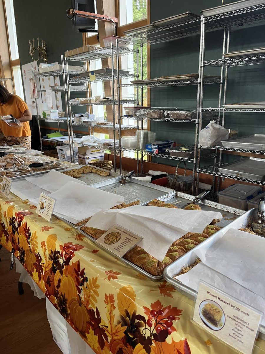 Joyful greetings fill the expansive room at Soorp Khatch Armenian Apostolic Church. Tables scattered around the space hold traditional Armenian cuisine, its aroma filling the air. 